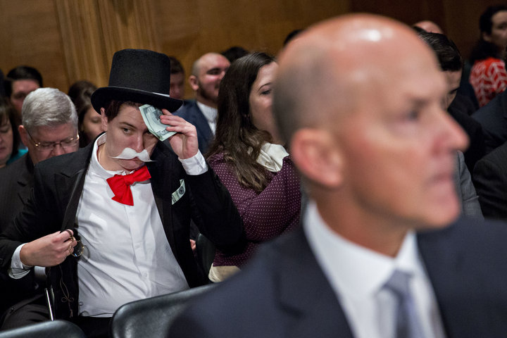 Monopoly Man Crashes Equifax Hearing to Protest Forced Arbitration